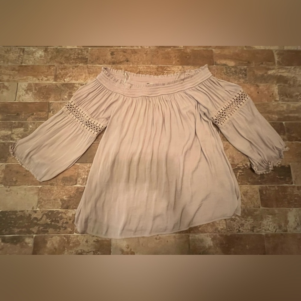 Jennifer Lopez shirt. Size L. In tan color.